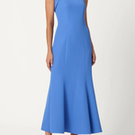 Woman wearing a blue one-shoulder dress on a white background