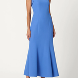 Woman wearing a blue one-shoulder dress on a white background