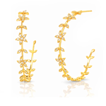 A pair of gold hoop earrings decorated with delicate leaf and flower motifs, embellished with small clear crystals, shown on a clean white background with a soft reflection.