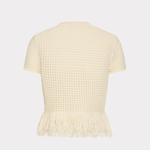 A cream-colored short-sleeve knit top with a textured openwork pattern and a fringed hem, shown from the back against a light gray background.