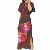 Woman wearing a floral dress on a white background