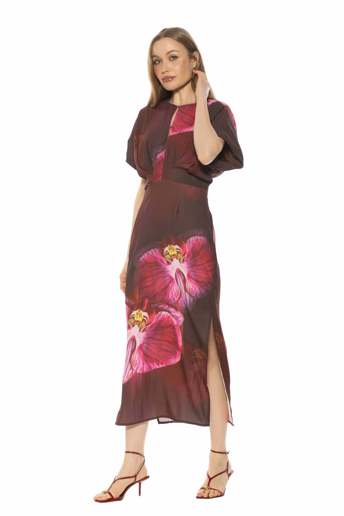 Woman wearing a floral dress on a white background