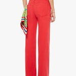 Person wearing red pants with a colorful scarf on a white background