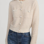 Check-pattern cardigan with subtle lurex shimmer, worn open over a neutral top