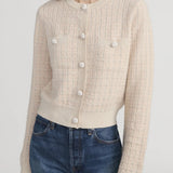 Check-pattern cardigan with subtle lurex shimmer, worn open over a neutral top