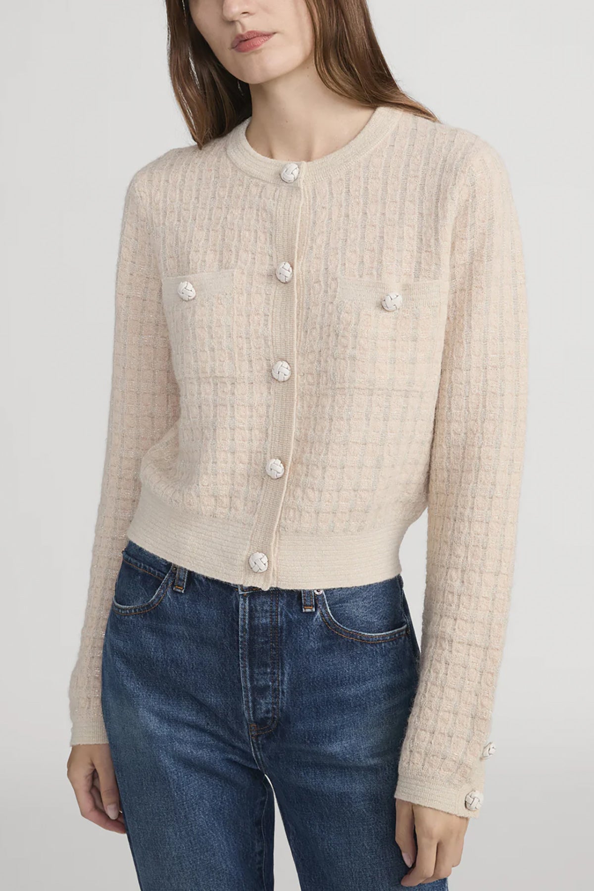 Check-pattern cardigan with subtle lurex shimmer, worn open over a neutral top