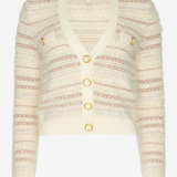 A cream and beige striped knit cardigan sweater with gold buttons, shown against a plain white background.