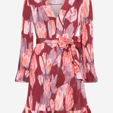 A long-sleeve wrap dress with a tie waist, featuring a pink and red floral tulip print on a light gray background.