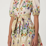 Floral dress with a belt on a white background
