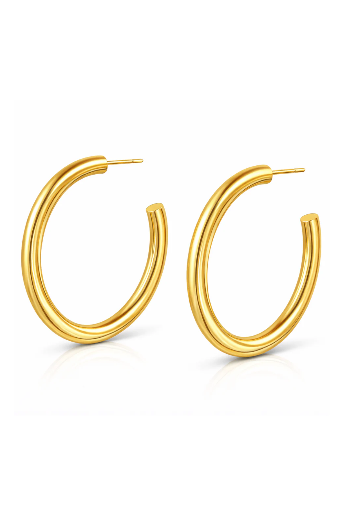 Gold hoop earrings on a white background
