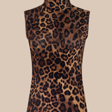 A sleeveless mock neck top with a brown and black leopard print pattern, displayed on a mannequin against a solid beige background.