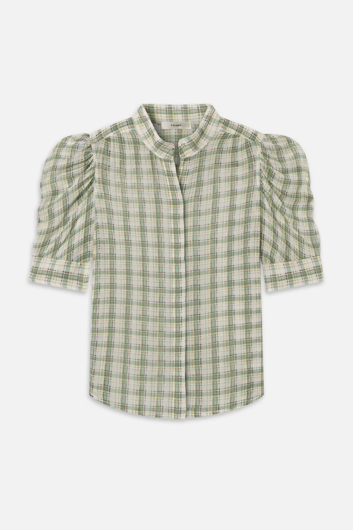 Model wearing a light green printed blouse with a relaxed silhouette