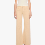A model wearing a cream short-sleeve top and light beige wide-leg cropped pants with black pointed-toe heels, shown against a plain white studio background.