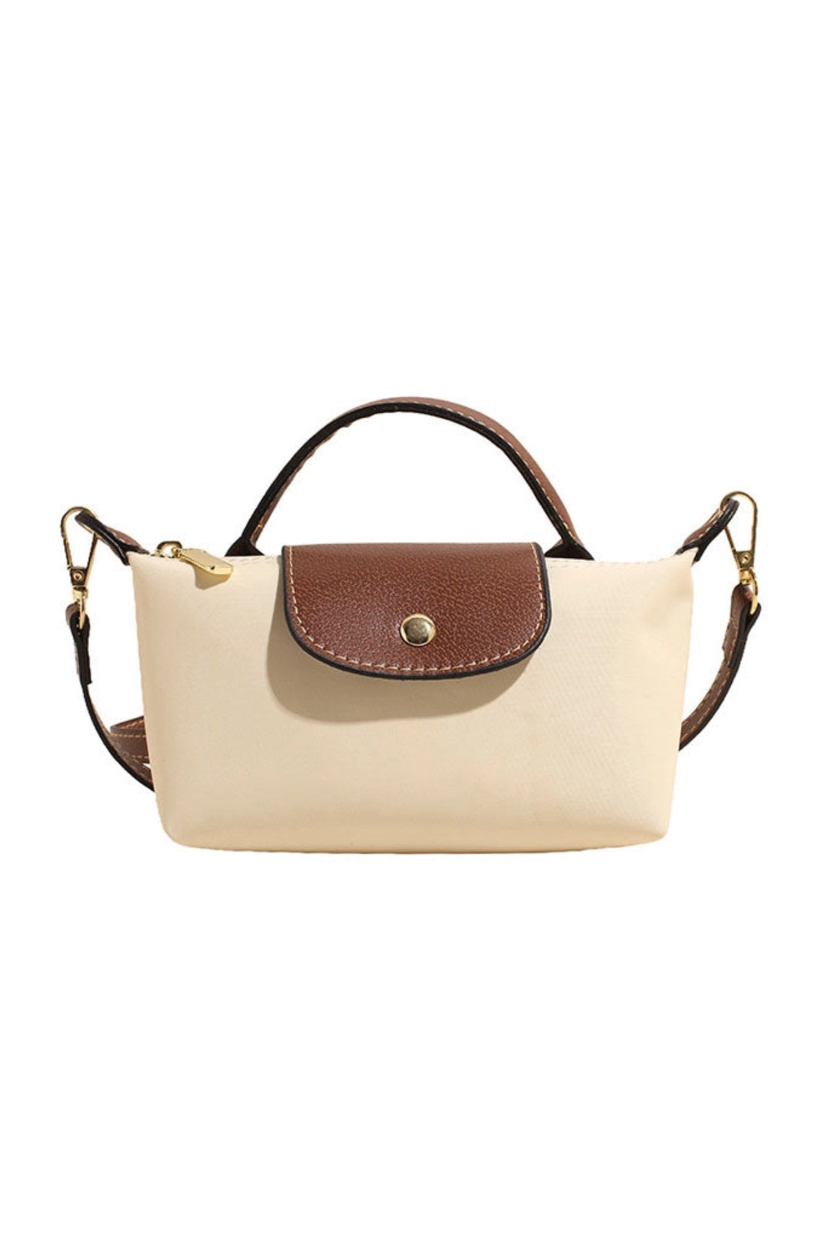 Beige handbag with brown leather flap and handle on a white background