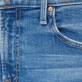 Close-up of blue denim jeans with stitching details