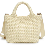 Cream-colored woven handbag with a shoulder strap on a white background