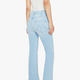 Light blue jeans worn by a person on a white background