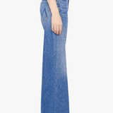 Model wearing light-wash straight-leg denim jeans with a cropped ankle-length silhouette.