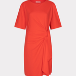 Orange dress with a knot detail on a white background