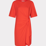 Orange dress with a knot detail on a white background