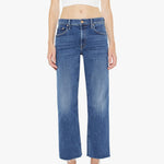 Person wearing blue jeans and a white tank top on a white background