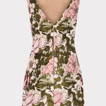 Floral dress with pink and green flowers on a white background