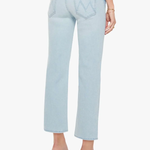 Light blue jeans worn by a person on a white background