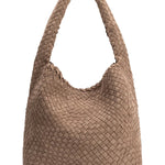 Brown woven handbag on a white background