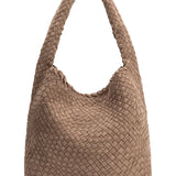 Brown woven handbag on a white background