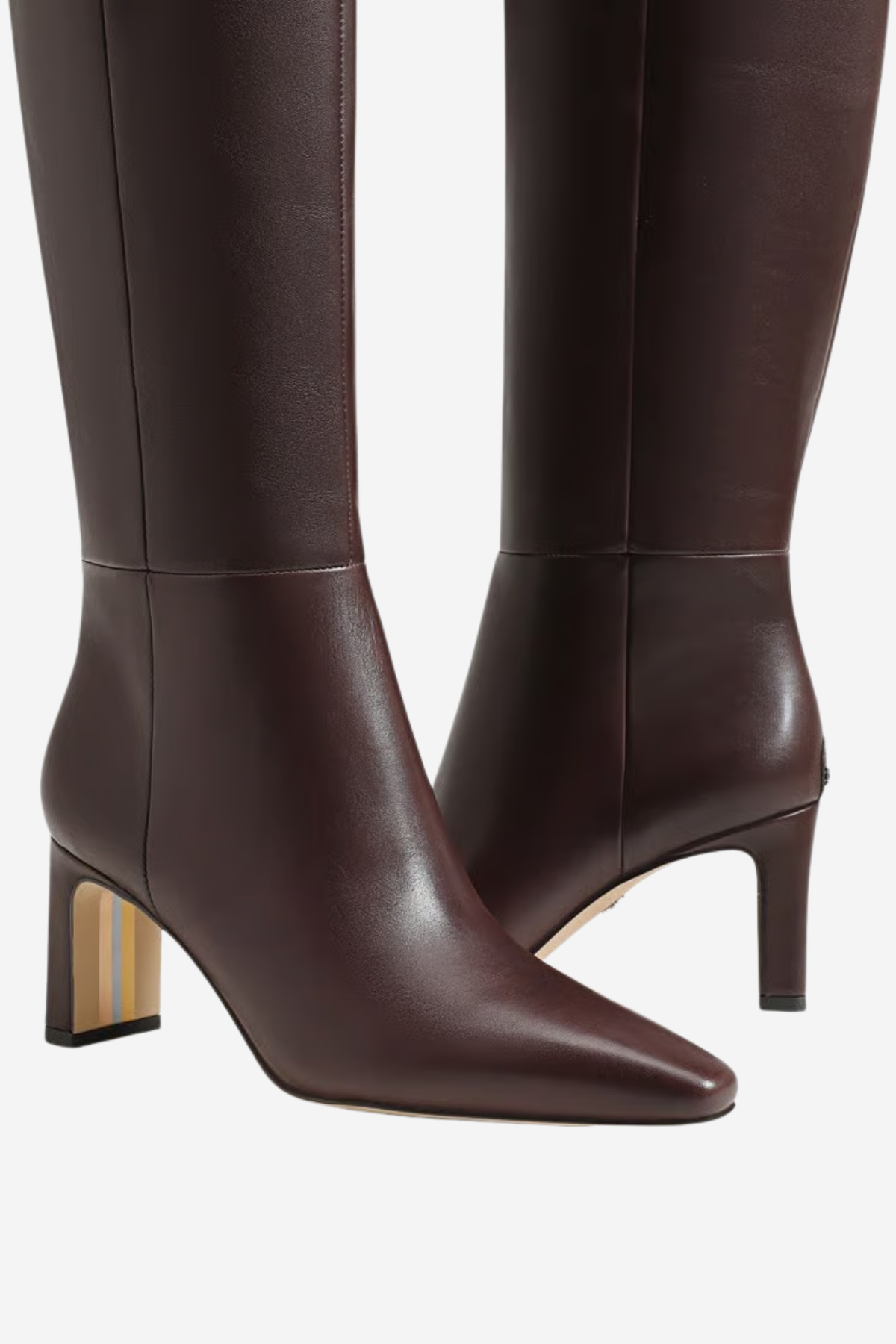 A pair of dark brown leather knee-high boots with pointed toes and block heels, shown against a plain light gray background.