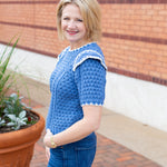 Short sleeve knit sweater with contrast embroidery detail