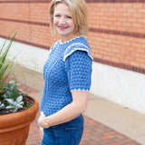 Short sleeve knit sweater with contrast embroidery detail