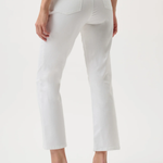 White pants worn by a person on a white background