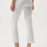 White pants worn by a person on a white background