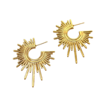 Gold sunburst earrings on a white background