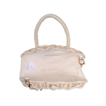Beige handbag with decorative elements on a white background