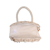 Beige handbag with decorative elements on a white background
