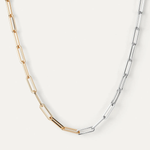 Two-tone gold and silver chain necklace on a white background