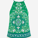 A green halter-neck dress featuring an intricate multicolor floral and mandala pattern, with thin shoulder straps and a decorative patterned hem, shown against a plain white background.