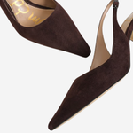 A pair of dark brown suede slingback pumps with pointed toes and low block heels, shown on a clean white background.