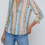 Three-quarter sleeve blouse with a soft stripe pattern.