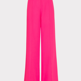 Bright pink wide-leg pants on a light gray background