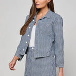 Cropped structured jacket in a blue tone.