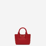 Small structured red tote bag with dual top handles and a compact, polished silhouette.
