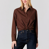 Women's navy long-sleeve top featuring a relaxed silhouette and classic neckline.