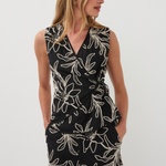 Woman wearing a black floral top
