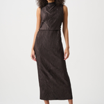 Woman wearing a dark brown dress on a white background