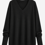 A black long-sleeve V-neck sweater with a relaxed, oversized fit, shown against a plain light gray background.