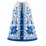 Blue and white floral dress with buttons on a white background