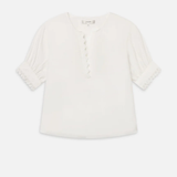 Ivory popover blouse with a relaxed fit and clean minimalist styling.